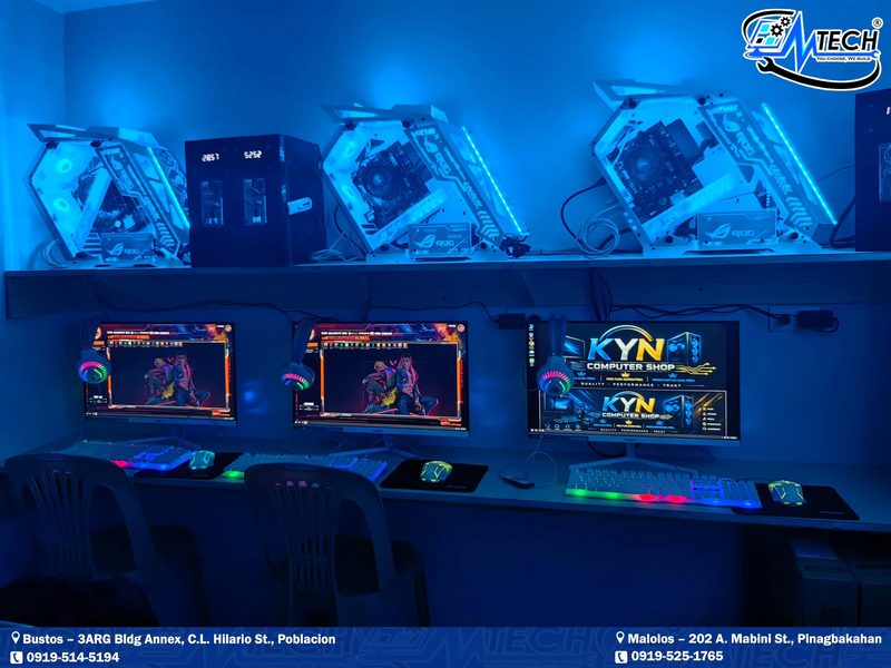 Blue RGB stations under the shop's own neon sign