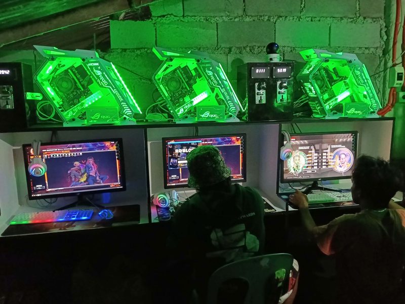 Green RGB setup — lights on, games running